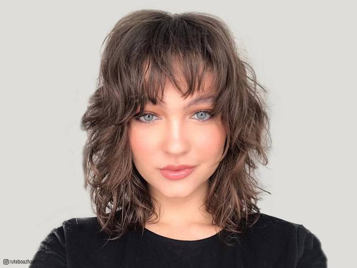 Hairstyles for layered hair with bangs